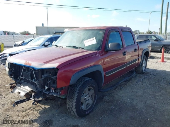 2004 Chevrolet Silverado 1500 Crew Cab Z71 with VIN 2GCEK13T141418363, listed as a IAAI auction lot 41472218 with 155,765 mi miles. Bid and sale history available at carsss.com. Image 2.