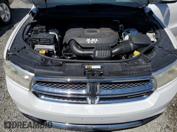 2013 Dodge Durango SXT z VIN 1C4RDHAG5DC673733, wystawiony jako Copart lot #56464215 z przebiegiem 224 075 mil mil oraz Czysty tytuł • Clean title. Historia ofert i sprzedaży dostępna na DreamBid. Obrazek 12.
