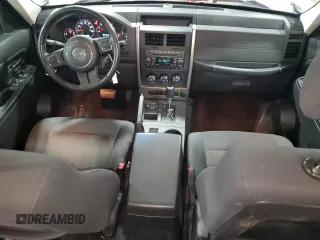 2012 Jeep Liberty Sport with VIN 1C4PJMAK1CW171926, listed as a Copart auction lot 83310004 with 180,085 mi miles and Salvage Title. Bid and sale history available at carsss.com. Image 8.