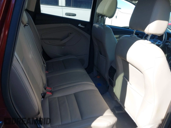 2015 Ford Escape Titanium with VIN 1FMCU0J92FUB55712, listed as a IAAI auction lot 41627867 with 156,438 mi miles. Bid and sale history available at carsss.com. Image 8.