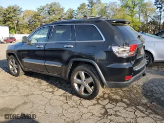 2012 Jeep Grand Cherokee Overland with VIN 1C4RJFCG4CC292383, listed as a Copart auction lot 51168385 with 132,697 mi miles and Salvage Title. Bid and sale history available at carsss.com. Image 2.