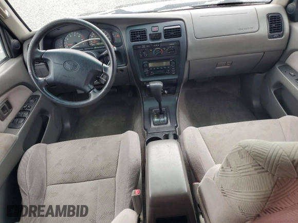 2002 Toyota 4Runner SR5 z VIN JT3GN86R220227055, wystawiony jako Copart lot #59354055 z przebiegiem 306 121 mil mil oraz Czysty tytuł • Clean title. Historia ofert i sprzedaży dostępna na DreamBid. Obrazek 8.