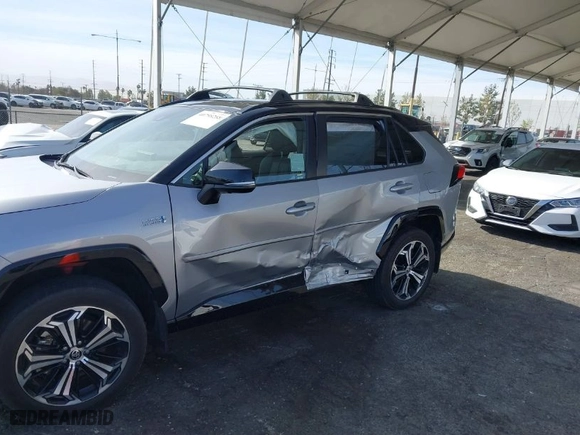 2021 Toyota RAV4 Prime XSE with VIN JTMFB3FV7MD055360, listed as a IAAI auction lot 40798288 with 20,157 mi miles. Bid and sale history available at carsss.com. Image 6.