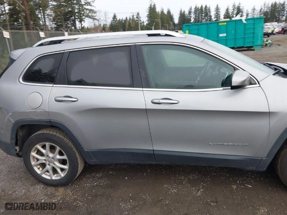 2014 Jeep Cherokee Latitude with VIN 1C4PJLCS0EW322121, listed as a IAAI auction lot 41764642 with 48,766 mi miles. Bid and sale history available at carsss.com. Image 13.
