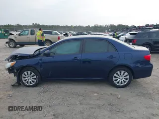 2012 Toyota Corolla L with VIN 5YFBU4EE6CP030641, listed as a IAAI auction lot 41864311 with 102,000 mi miles. Bid and sale history available at carsss.com. Image 14.