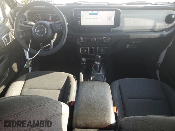 2024 Jeep Wrangler Sport S with VIN 1C4PJXDN6RW297070, listed as a Copart auction lot 56965465 with 21,872 mi miles and Salvage title. Bid and sale history available at DreamBid. Image 8.