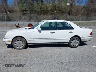 1999 Mercedes-Benz E-Class with VIN WDBJF82H4XX025925, listed as a IAAI auction lot 41839398 with 238,583 mi miles. Bid and sale history available at carsss.com. Image 14.