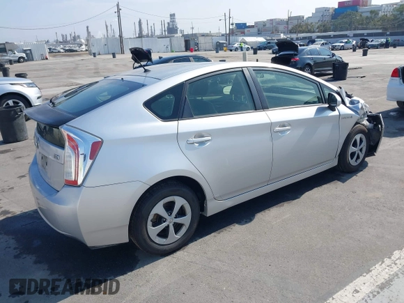 2015 Toyota Prius Four with VIN JTDKN3DU9F2001704, listed as a IAAI auction lot 42748429 with 193,725 mi miles and . Bid and sale history available at DreamBid. Image 4.