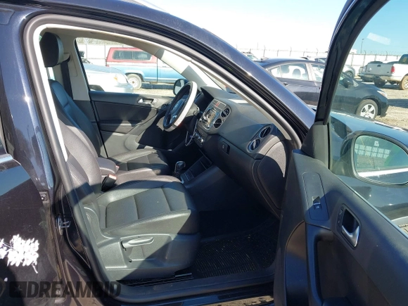 2011 Volkswagen Tiguan SE with VIN WVGBV7AX1BW502770, listed as a IAAI auction lot 41739698 with 160,556 mi miles and . Bid and sale history available at DreamBid. Image 5.