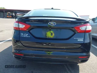 2016 Ford Fusion Titanium with VIN 3FA6P0K90GR333848, listed as a IAAI auction lot 42728138 with 147,864 mi miles and . Bid and sale history available at DreamBid. Image 16.