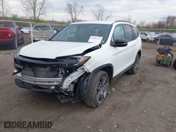 2022 Honda Pilot Sport with VIN 5FNYF6H32NB051544, listed as a IAAI auction lot 42081135 with 16,728 mi miles and . Bid and sale history available at carsss.com. Image 2.