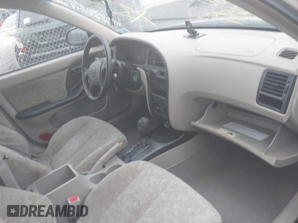 2001 Hyundai Elantra GLS z VIN KMHDN45D71U080537, wystawiony jako IAAI lot #42095959 z przebiegiem Nie podano mil oraz . Historia ofert i sprzedaży dostępna na DreamBid. Obrazek 5.
