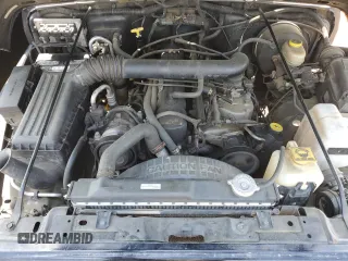 1999 Jeep Wrangler Sport with VIN 1J4FY19S9XP423684, listed as a Copart auction lot 55079455 with 149,756 mi miles and Salvage Title. Bid and sale history available at carsss.com. Image 11.