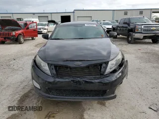 2014 Kia Optima LX z VIN 5XXGM4A79EG331820, wystawiony jako Copart lot #55628945 z przebiegiem Nie podano mil oraz Szkoda całkowita • Salvage title. Historia ofert i sprzedaży dostępna na DreamBid. Obrazek 5.