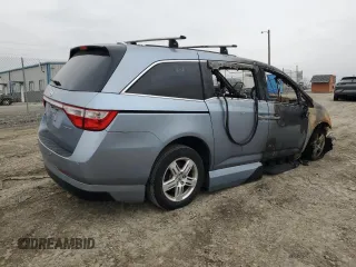 2012 Honda Odyssey Touring with VIN 5FNRL5H92CB127191, listed as a Copart auction lot 44720295 with Not Provided miles and Salvage Title. Bid and sale history available at DreamBid. Image 3.