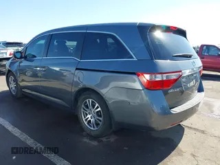 2012 Honda Odyssey EX-L with VIN 5FNRL5H64CB044075, listed as a IAAI auction lot 42094680 with 67,165 mi miles and . Bid and sale history available at carsss.com. Image 3.