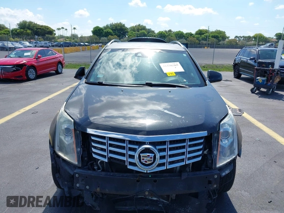 2013 Cadillac SRX Premium Collection with VIN 3GYFNEE34DS535613, listed as a IAAI auction lot 42336365 with 106,426 mi miles and . Bid and sale history available at DreamBid. Image 13.