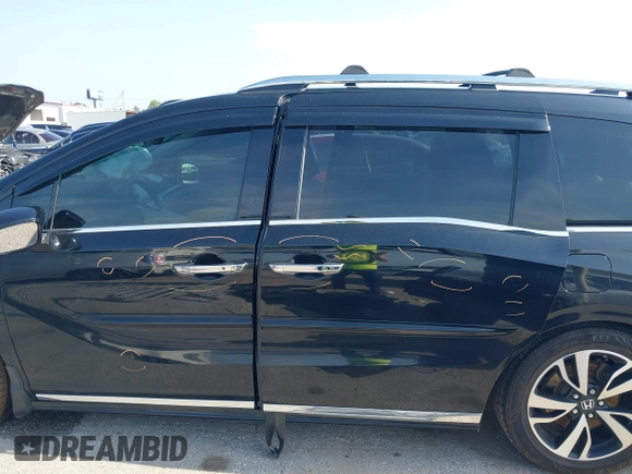 2019 Honda Odyssey Elite with VIN 5FNRL6H92KB089949, listed as a IAAI auction lot 42217646 with 61,193 mi miles and . Bid and sale history available at DreamBid. Image 14.