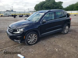 2015 Volkswagen Tiguan SE with VIN WVGAV7AX6FW591334, listed as a Copart auction lot 58157105 with 157,207 mi miles and Salvage title. Bid and sale history available at DreamBid. Image 1.
