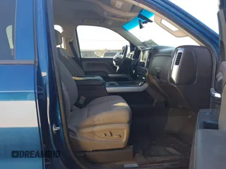 2017 Chevrolet Silverado 1500 LT with VIN 3GCUKREC8HG354004, listed as a IAAI auction lot 41429597 with 77,493 mi miles and . Bid and sale history available at DreamBid. Image 5.