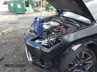 2021 Lexus UX 250h with VIN JTHX9JBHXM2042844, listed as a IAAI auction lot 41213573 with 31,650 mi miles and . Bid and sale history available at DreamBid. Image 6.