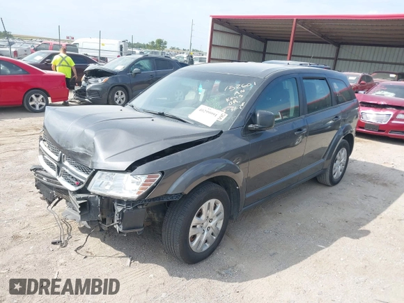 2015 Dodge Journey American Value Pkg with VIN 3C4PDCAB2FT641361, listed as a IAAI auction lot 40299991 with 202,003 mi miles. Bid and sale history available at carsss.com. Image 2.