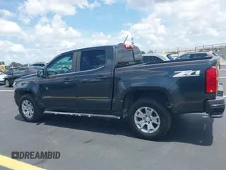 2018 Chevrolet Colorado 2WD LT z VIN 1GCGSCEA9J1137767, wystawiony jako IAAI lot #42389519 z przebiegiem 116 547 mil mil oraz . Historia ofert i sprzedaży dostępna na DreamBid. Obrazek 14.
