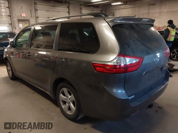 2015 Toyota Sienna LE AAS with VIN 5TDKK3DC6FS652281, listed as a IAAI auction lot 41891750 with 150,162 mi miles. Bid and sale history available at carsss.com. Image 3.