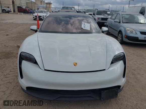 2022 Porsche Taycan z VIN WP0AA2Y10NSA12920, wystawiony jako IAAI lot #42047850 z przebiegiem 22 300 mil mil oraz . Historia ofert i sprzedaży dostępna na DreamBid. Obrazek 6.