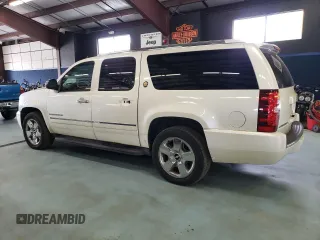 2010 Chevrolet Suburban LTZ with VIN 1GNUKKE3XAR253406, listed as a Copart auction lot 74265134 with 215,598 mi miles and Clean Title. Bid and sale history available at carsss.com. Image 2.