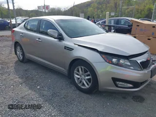 2012 Kia Optima LX with VIN KNAGM4A78C5283175, listed as a IAAI auction lot 42075886 with 123,112 mi miles and . Bid and sale history available at carsss.com. Image 1.
