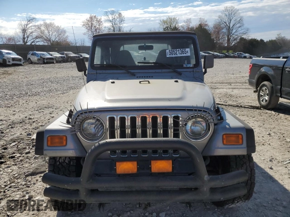 2000 Jeep Wrangler Sport with VIN 1J4FA49S4YP789348, listed as a Copart auction lot 50521365 with 0 mi miles and Salvage Title. Bid and sale history available at carsss.com. Image 5.