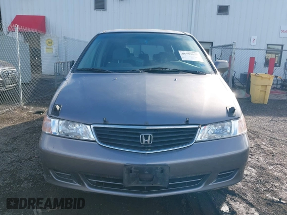 2000 Honda Odyssey EX with VIN 2HKRL1863YH621471, listed as a IAAI auction lot 41702650 with 167,050 mi miles and . Bid and sale history available at DreamBid. Image 12.