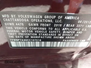 2012 Volkswagen Passat SE z VIN 1VWBP7A30CC107216, wystawiony jako IAAI lot #42545676 z przebiegiem 151 417 mil mil oraz . Historia ofert i sprzedaży dostępna na DreamBid. Obrazek 9.