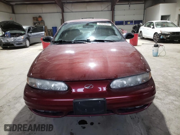 2003 Oldsmobile Alero GL1 z VIN 1G3NL52E43C227391, wystawiony jako Copart lot #43970245 z przebiegiem 100 732 mil mil oraz Szkody całkowita. Historia ofert i sprzedaży dostępna na DreamBid. Obrazek 5.