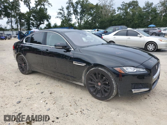 2017 Jaguar XF 20d Prestige with VIN SAJBE4BN7HCY46597, listed as a Copart auction lot 74809264 with 89,817 mi miles and Salvage Title. Bid and sale history available at carsss.com. Image 4.