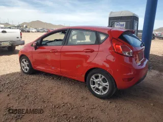 2014 Ford Fiesta SE with VIN 3FADP4EJ4EM212240, listed as a Copart auction lot 54534725 with 104,650 mi miles and Salvage Title. Bid and sale history available at DreamBid. Image 2.