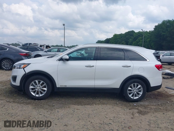 2017 Kia Sorento LX z VIN 5XYPGDA57HG197895, wystawiony jako IAAI lot #42265132 z przebiegiem 100 154 mil mil oraz . Historia ofert i sprzedaży dostępna na DreamBid. Obrazek 15.