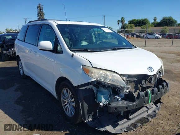2012 Toyota Sienna XLE AAS with VIN 5TDYK3DC6CS240285, listed as a IAAI auction lot 42778248 with 122,091 mi miles and . Bid and sale history available at DreamBid. Image 1.