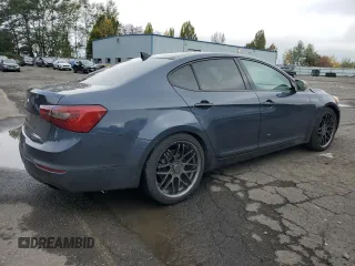 2014 Kia Cadenza Premium with VIN KNALN4D75E5123328, listed as a Copart auction lot 77590774 with 70,414 mi miles and Salvage Title. Bid and sale history available at carsss.com. Image 3.