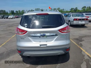 2014 Ford Escape Titanium with VIN 1FMCU0JX7EUA28824, listed as a IAAI auction lot 42065325 with 107,761 mi miles. Bid and sale history available at carsss.com. Image 16.