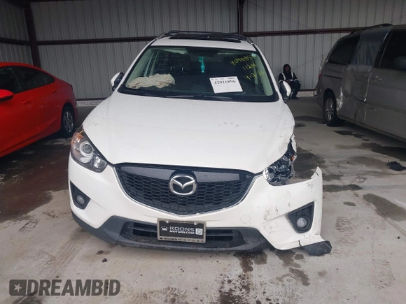 2014 Mazda CX-5 Touring with VIN JM3KE4CY9E0370610, listed as a IAAI auction lot 42016896 with 72,340 mi miles. Bid and sale history available at carsss.com. Image 11.