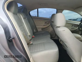 2014 Ford Taurus SE z VIN 1FAHP2D86EG143517, wystawiony jako Copart lot #51066975 z przebiegiem 134 892 mil mil oraz Szkoda całkowita • Salvage title. Historia ofert i sprzedaży dostępna na DreamBid. Obrazek 10.