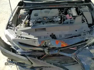 2023 Toyota Camry SE z VIN 4T1G11AK2PU816899, wystawiony jako Copart lot #71799045 z przebiegiem 52 796 mil mil oraz Czysty tytuł • Clean title. Historia ofert i sprzedaży dostępna na DreamBid. Obrazek 13.