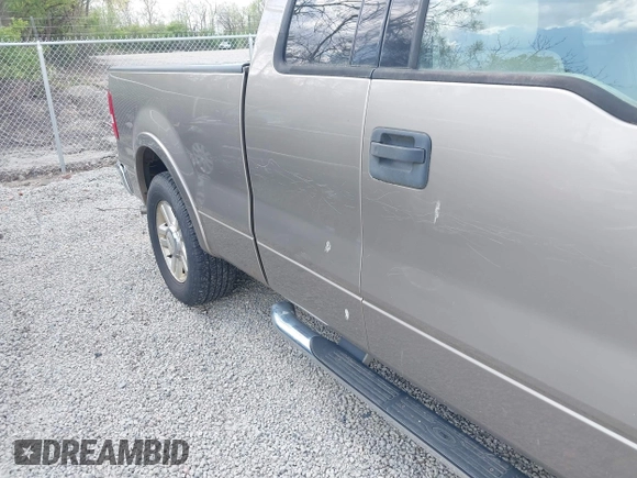 2004 Ford F-150 XL with VIN 1FTPX12584NA58780, listed as a IAAI auction lot 42123687 with 160,672 mi miles. Bid and sale history available at carsss.com. Image 6.