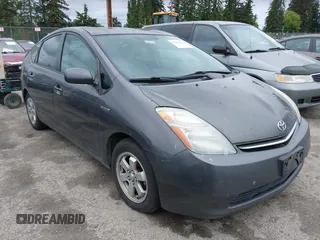 2007 Toyota Prius z VIN JTDKB20U673267007, wystawiony jako IAAI lot #42293810 z przebiegiem 260 283 mil mil oraz . Historia ofert i sprzedaży dostępna na DreamBid. Obrazek 1.