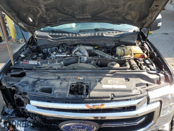2021 Ford Super Duty F-250 SRW XL with VIN 1FT7W2BT1MEC51277, listed as a Copart auction lot 43544475 with 99,324 mi miles and Salvage Title. Bid and sale history available at carsss.com. Image 11.