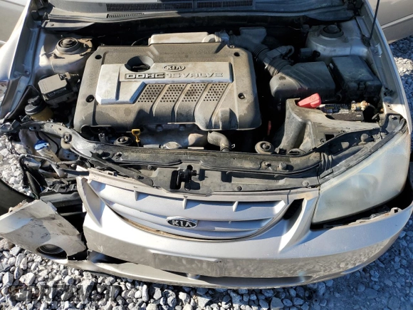 2006 Kia Spectra EX z VIN KNAFE121265353582, wystawiony jako Copart lot #52747635 z przebiegiem 99 087 mil mil oraz Szkoda całkowita • Salvage title. Historia ofert i sprzedaży dostępna na DreamBid. Obrazek 12.