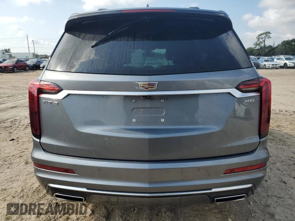 2021 Cadillac XT6 Premium Luxury with VIN 1GYKPCRS5MZ198953, listed as a Copart auction lot 67291154 with 0 mi miles and Salvage Title. Bid and sale history available at carsss.com. Image 6.