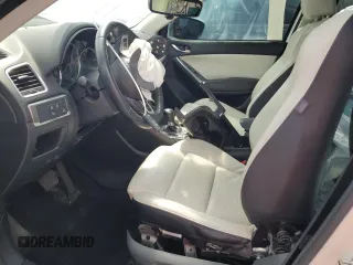 2016 Mazda CX-5 Grand Touring with VIN JM3KE4DY4G0669259, listed as a Copart auction lot 50470145 with 0 mi miles and Non Repairable. Bid and sale history available at carsss.com. Image 7.